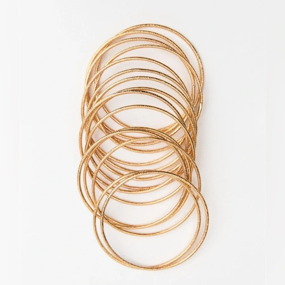 NWT. Zara Golden Pack of Multiple Textured Metal Bracelets.